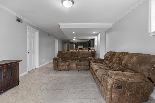 living room with ornamental molding