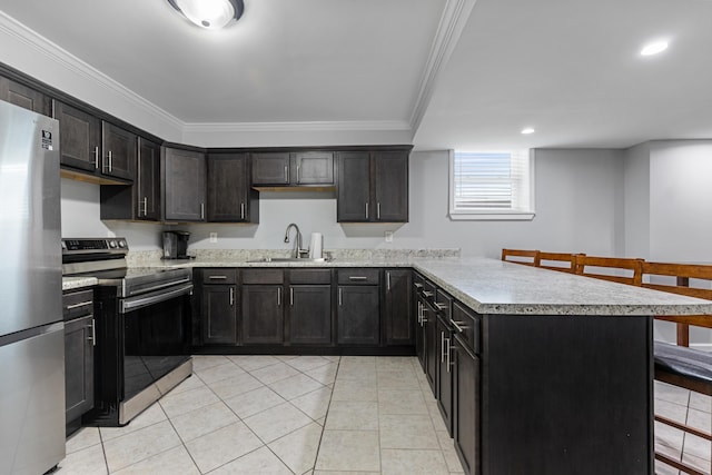 kitchen with sink, crown molding, light tile patterned flooring, stainless steel appliances, and dark brown cabinets