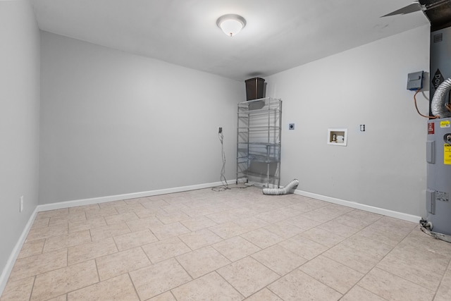 washroom with light tile patterned floors, water heater, washer hookup, and electric dryer hookup