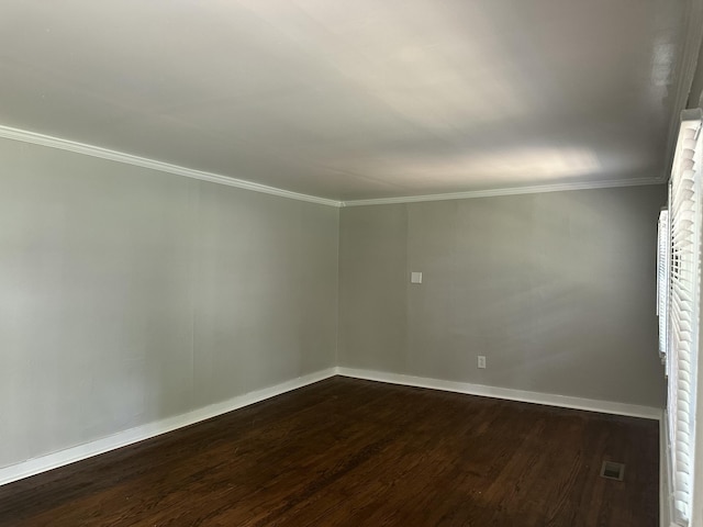 1453 Barnes St NE, Cleveland, TN 37311 - spare room with dark wood finished floors and ornamental molding