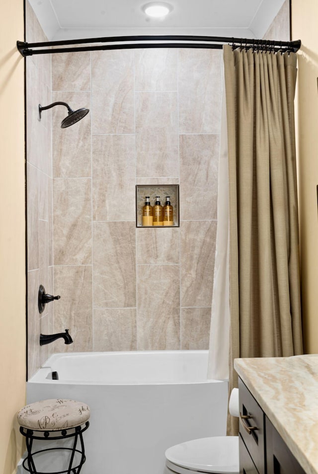 bathroom with shower / tub combo and toilet