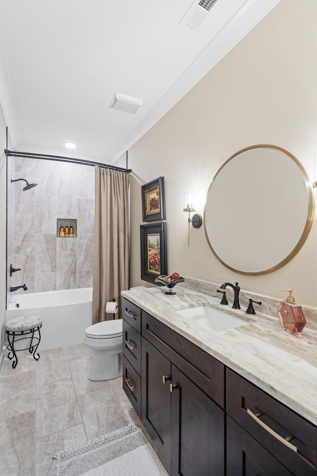 full bathroom with vanity, toilet, and shower / bath combo with shower curtain