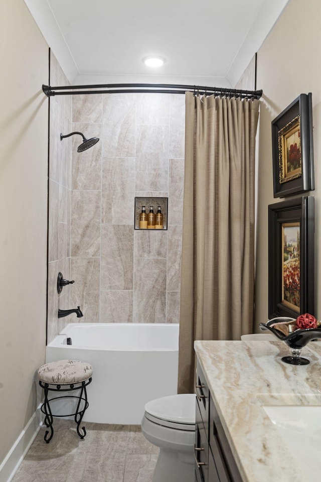 full bathroom with vanity, crown molding, toilet, and shower / bath combo with shower curtain