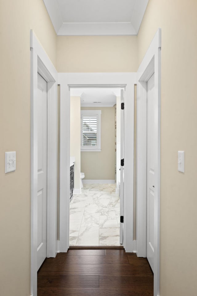 hallway with crown molding