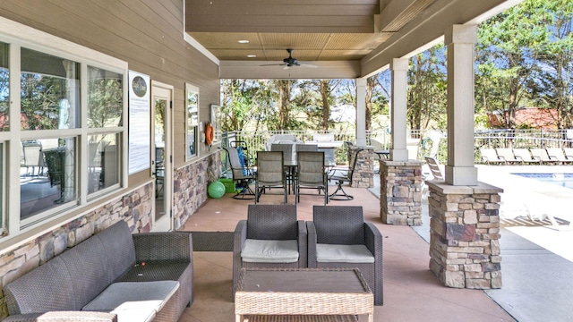 view of patio with an outdoor hangout area and ceiling fan