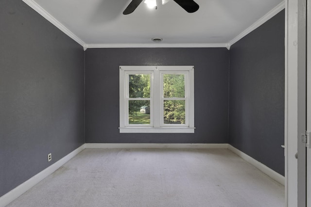 empty room with light carpet, ceiling fan, and crown molding