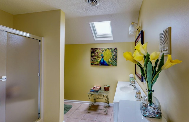 4809 Wind Bluff Cir, Birchwood, TN 37308 - bathroom featuring visible vents, vanity, a stall shower, tile patterned floors, and a textured ceiling