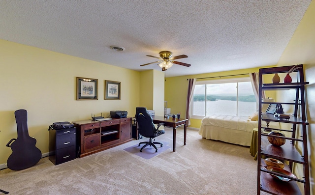 4809 Wind Bluff Cir, Birchwood, TN 37308 - home office featuring visible vents, light carpet, baseboards, and a ceiling fan