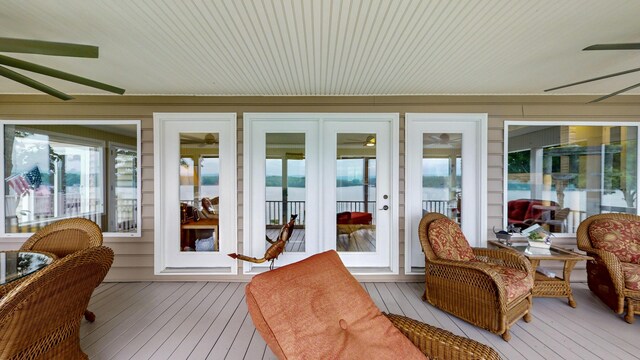 4809 Wind Bluff Cir, Birchwood, TN 37308 - sunroom with a ceiling fan and a healthy amount of sunlight
