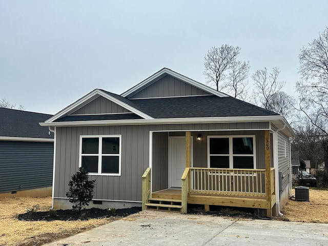 view of front of property with central air condition unit and a porch