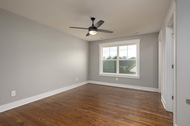 unfurnished bedroom featuring dark hardwood / wood-style floors and ceiling fan