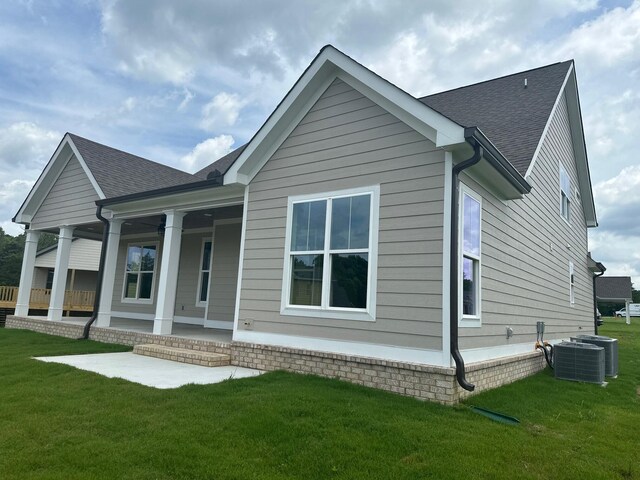 222 Arthur Ln NW, Cleveland, TN 37312 - rear view of house featuring ceiling fan and a patio