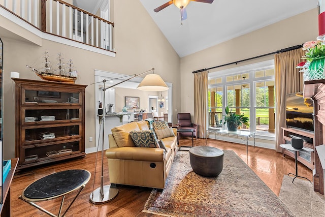 925 Wildcat Run Dr, Loudon, TN 37774 - living area featuring high vaulted ceiling, ceiling fan, and wood finished floors