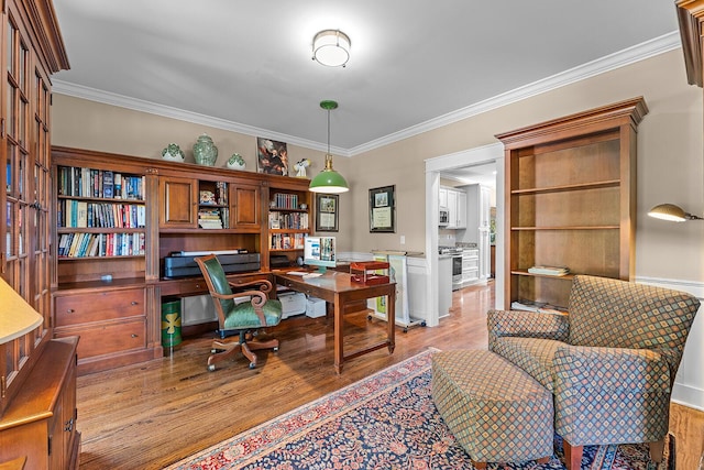 925 Wildcat Run Dr, Loudon, TN 37774 - home office with crown molding, light wood-type flooring, and built in desk