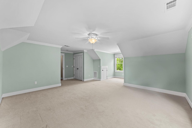 925 Wildcat Run Dr, Loudon, TN 37774 - additional living space with ceiling fan, vaulted ceiling, baseboards, and light colored carpet