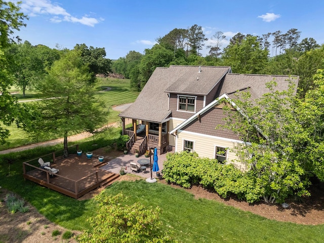 925 Wildcat Run Dr, Loudon, TN 37774 - back of house featuring a wooden deck, a patio, a yard, and roof with shingles