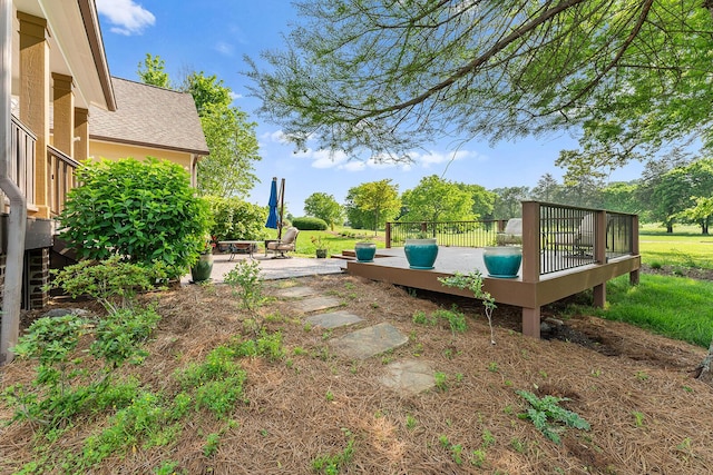 925 Wildcat Run Dr, Loudon, TN 37774 - view of yard featuring a wooden deck and a patio