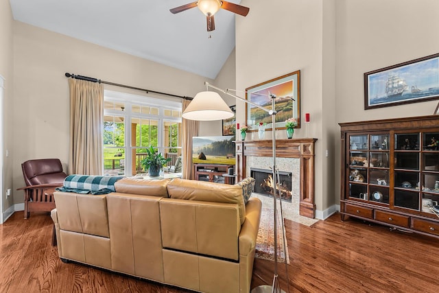 925 Wildcat Run Dr, Loudon, TN 37774 - living area with a ceiling fan, baseboards, wood finished floors, a high end fireplace, and high vaulted ceiling
