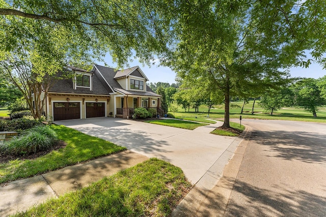 925 Wildcat Run Dr, Loudon, TN 37774 - view of front of home featuring concrete driveway and a front lawn