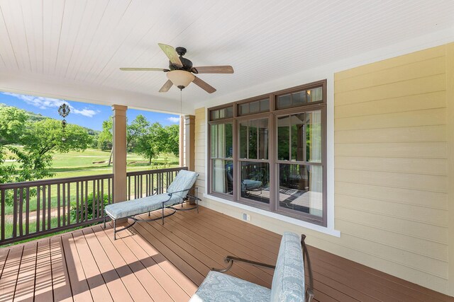 925 Wildcat Run Dr, Loudon, TN 37774 - wooden porch featuring a ceiling fan and view of golf course