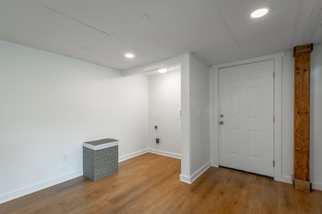 basement featuring wood-type flooring