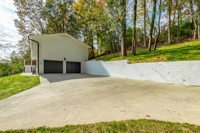 garage with a lawn