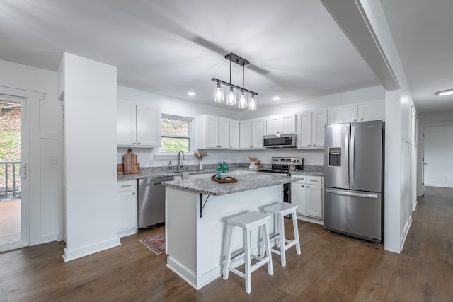 kitchen with white cabinetry and stainless steel appliances