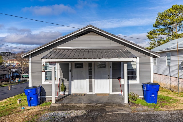 view of front of home featuring covered porch