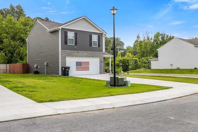 115 Belle Way, Athens, TN 37303 - view of front of property featuring driveway, brick siding, and an attached garage