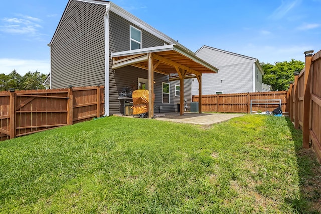 115 Belle Way, Athens, TN 37303 - back of property with a patio area and a fenced backyard
