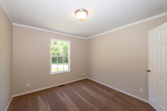 unfurnished room with carpet floors and ornamental molding