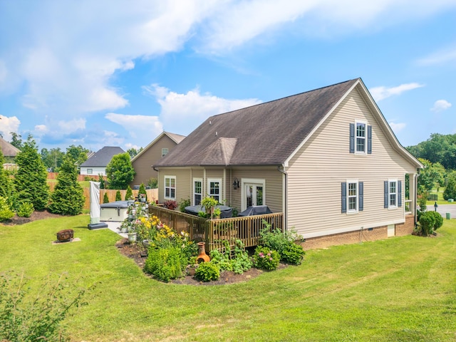 1726 Derby Ln NW, Cleveland, TN 37312 - rear view of property featuring a wooden deck, a fire pit, a yard, and a shingled roof