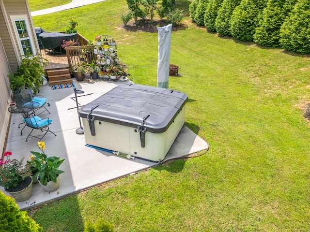 1726 Derby Ln NW, Cleveland, TN 37312 - view of green lawn featuring a wooden deck, a patio, and a hot tub