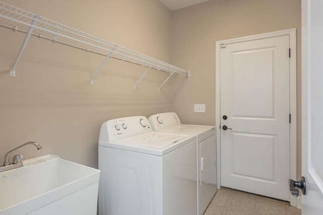 1726 Derby Ln NW, Cleveland, TN 37312 - laundry room with independent washer and dryer and light tile patterned floors