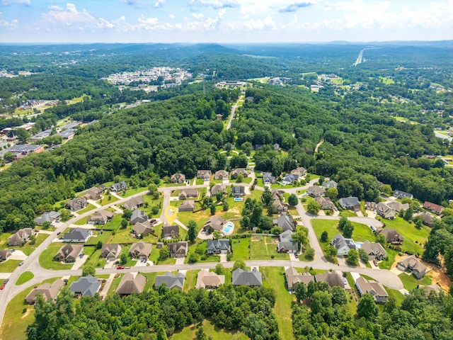 1726 Derby Ln NW, Cleveland, TN 37312 - aerial perspective of suburban area featuring a heavily wooded area