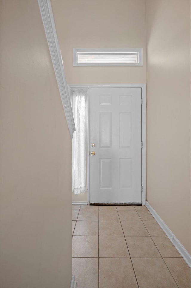 6585 Hickory Trace Cir, Chattanooga, TN 37421 - foyer entrance featuring light tile patterned floors and baseboards