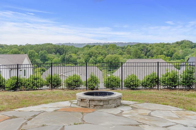 view of patio featuring a fire pit