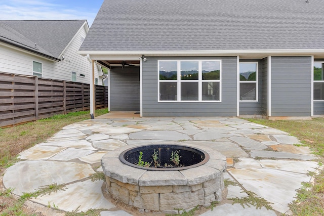 view of patio / terrace with a fire pit