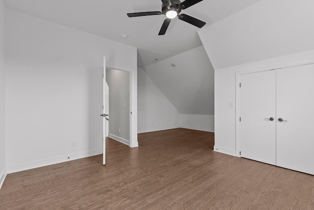 additional living space featuring ceiling fan, wood-type flooring, and lofted ceiling