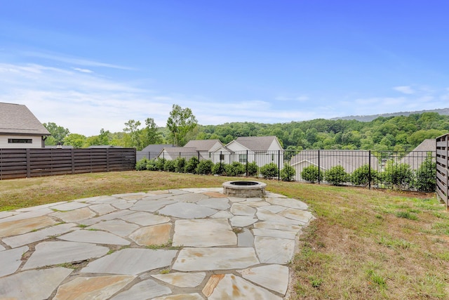 view of patio featuring a fire pit