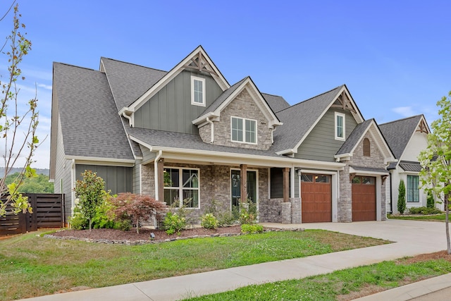 craftsman house with a front yard