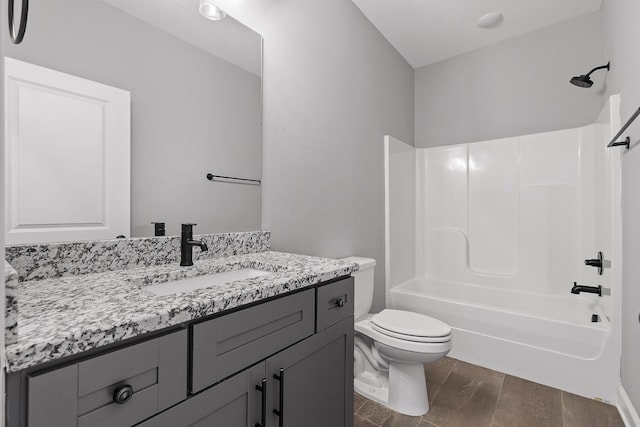 full bathroom featuring vanity,  shower combination, and toilet