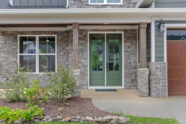 property entrance featuring covered porch