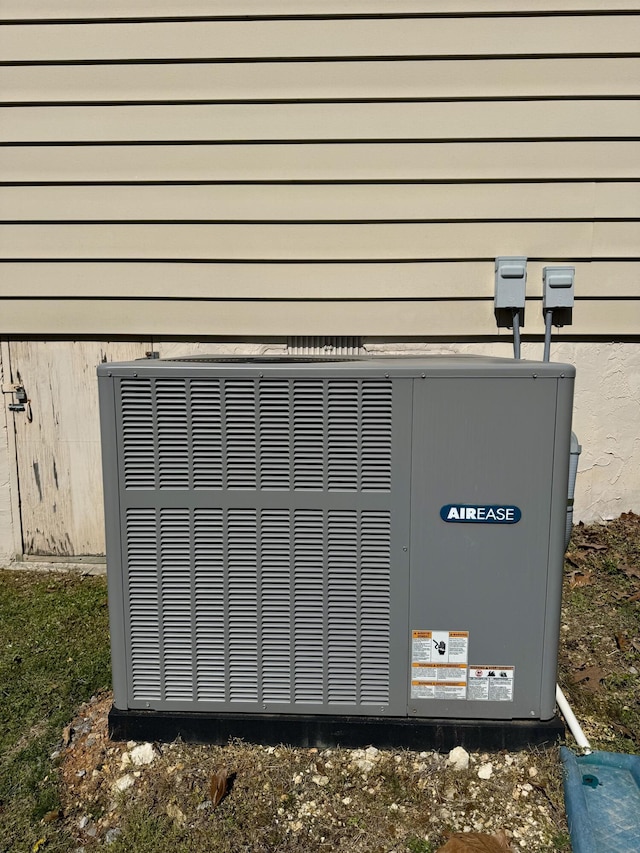 exterior details featuring cooling unit