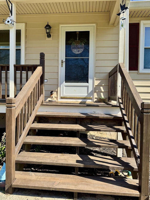 entrance to property with a porch
