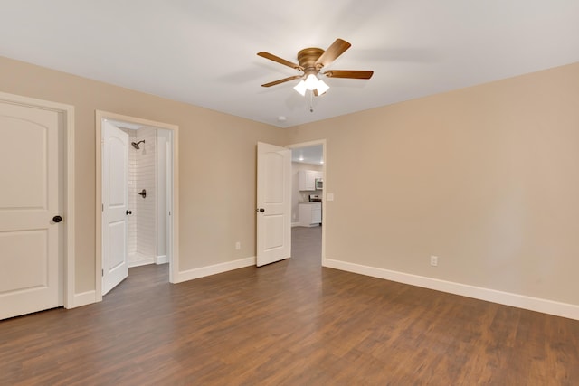 unfurnished bedroom with ceiling fan and dark hardwood / wood-style floors