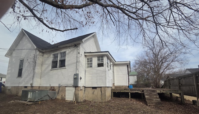 363 15th St NW, Cleveland, TN 37311 - view of home's exterior featuring a deck, central AC unit, crawl space, and fence
