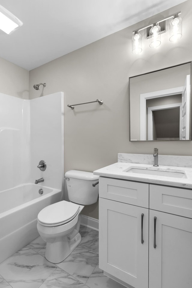 full bathroom with toilet, vanity, and tub / shower combination