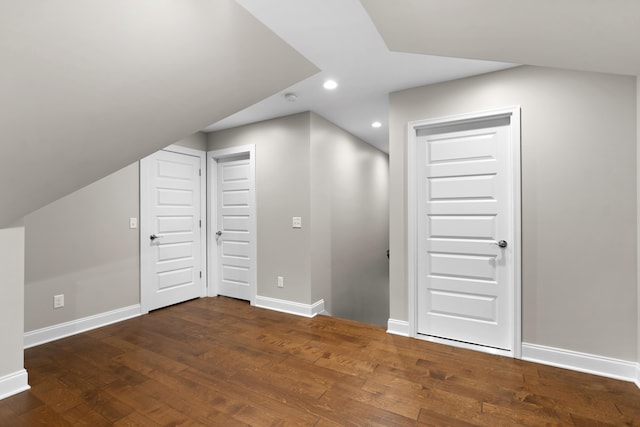 bonus room featuring dark hardwood / wood-style floors