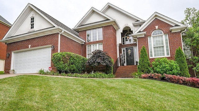 1967 Weston Hills Dr NW, Cleveland, TN 37312 - view of front of property featuring brick siding, a front lawn, concrete driveway, and stucco siding